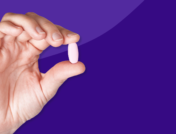 Hand holding Rx pill: Fluconazole side effects and how to avoid them