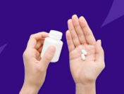 Hand holding Rx tablets: Viberzi without insurance