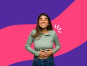 person holding their stomach - how to improve gut health