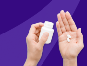A hand holding two Rx pills: How does hydroxychloroquine work for Lupus?