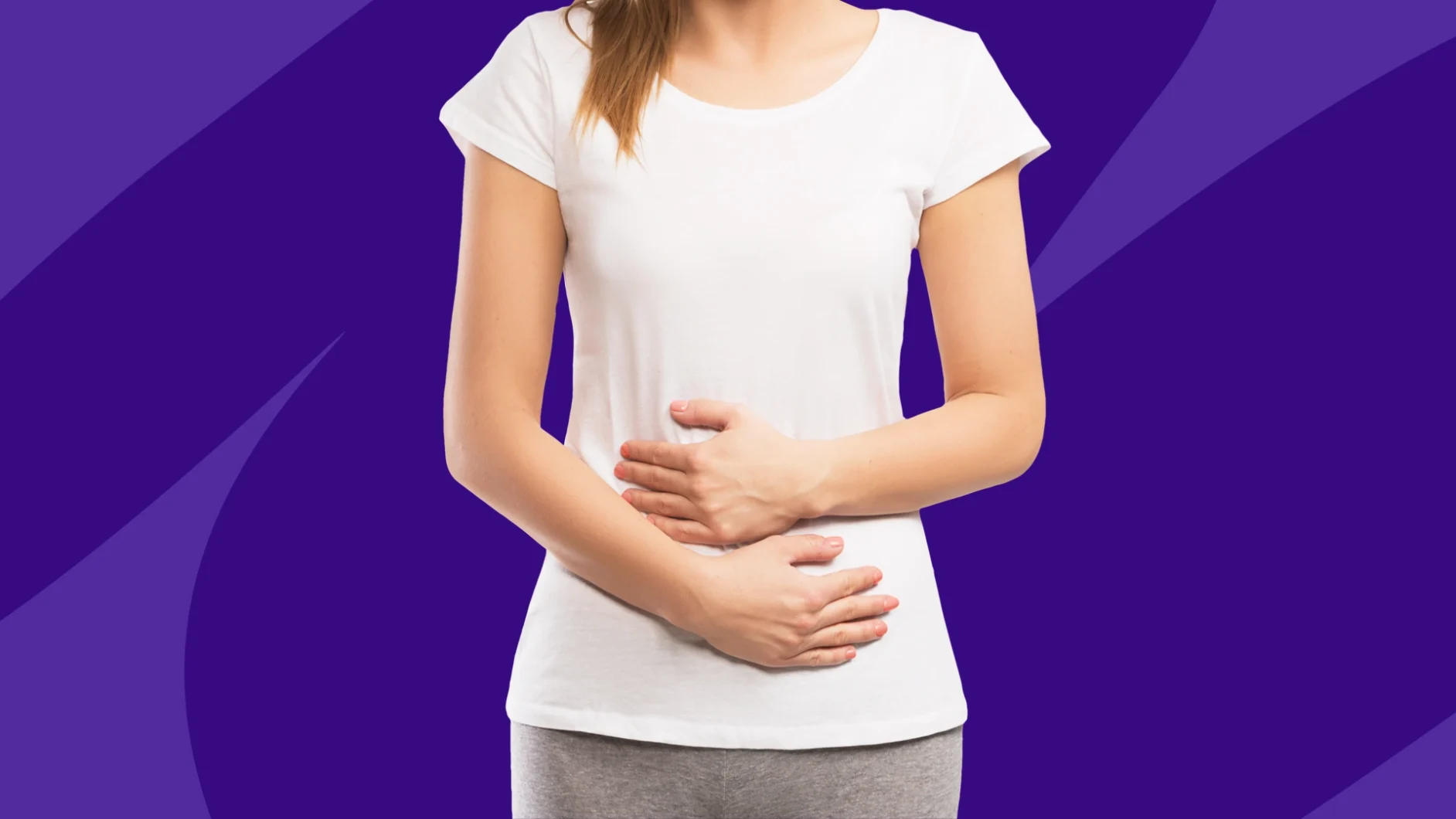 A woman holding her abdomen | Helping patients with menstrual pain