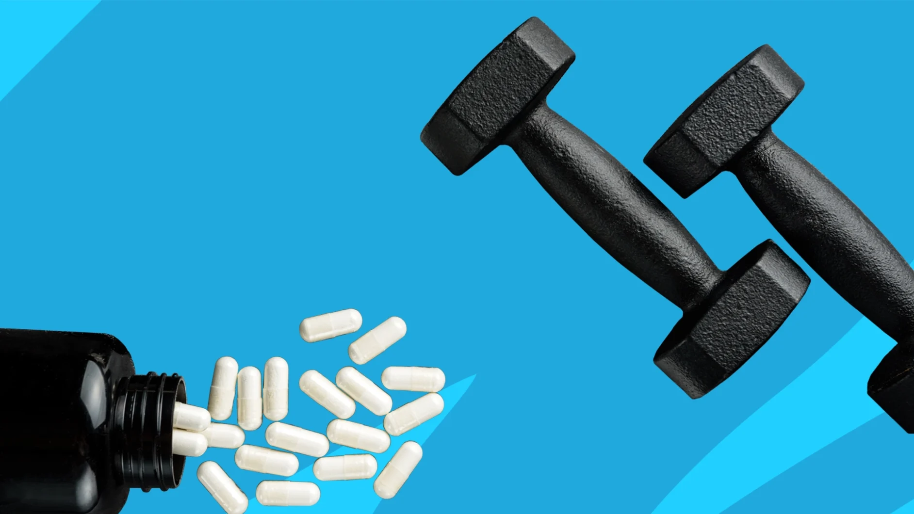 A bottle of pills and free weights | When to take L-carnitine