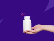 A hand holding an Rx pill bottle: Prednisone for ear infection