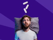 Man with his head on a pillow and Rx capsules over his head: Does sertraline make you sleepy?