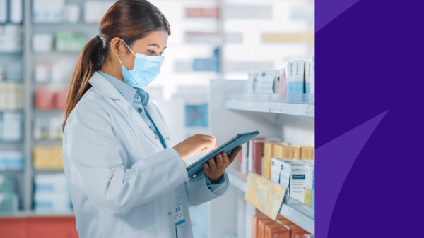 A pharmacist filling a prescription: How to get Dupixent: Specialty pharmacy considerations