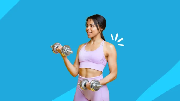 Woman holding dumbbells - exercise for pcos