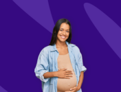 A person smiling, holding their belly: Can you take Rexulti while pregnant?