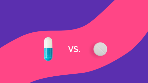 A capsule and a round tablet with "vs" between them: Vraylar vs. Zyprexa: Differences, similarities & side effects