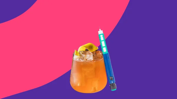 Cocktail next to a Zepbound injection pen - zepbound and alcohol