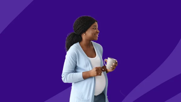 pregnant woman holding medication - levothyroxine and pregnancy