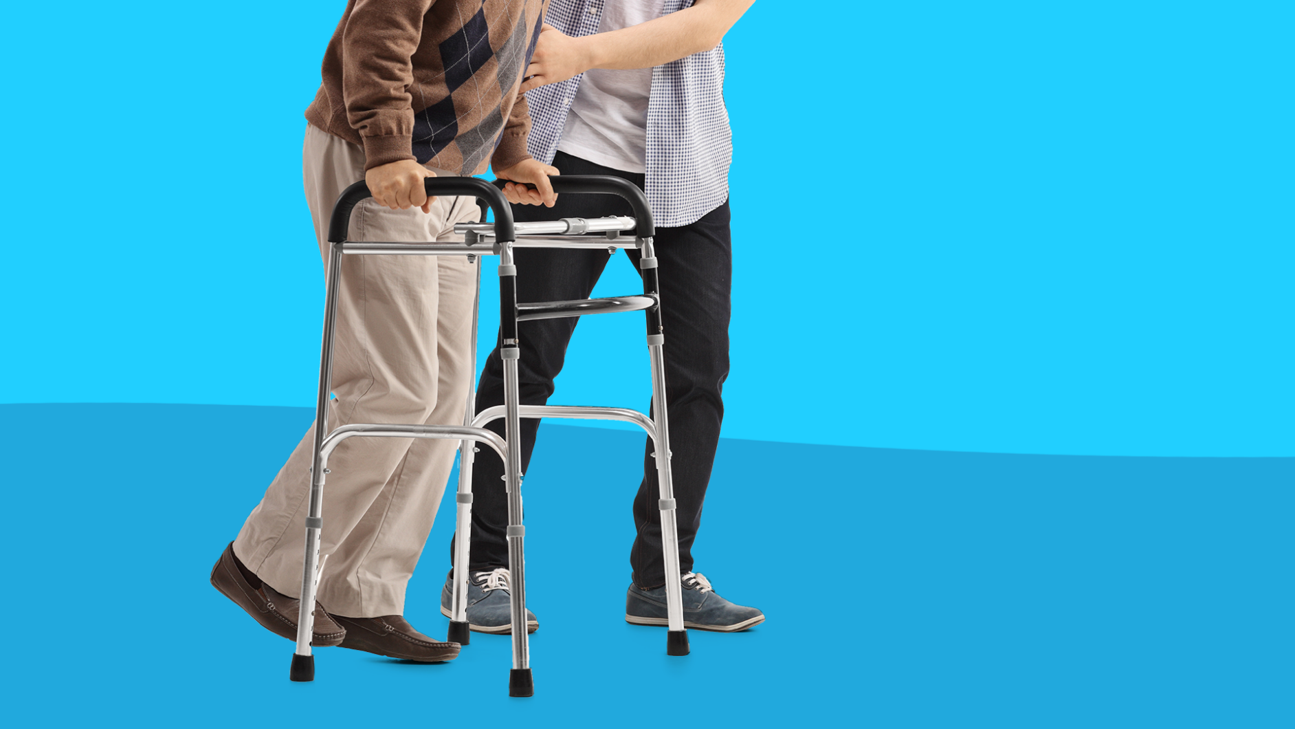 A younger man helping an older man walk: Tips for finding a caregiver for your loved one