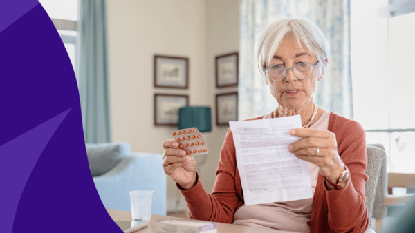 An older woman reviewing medication instructions: What are the side effects of Eliquis in the elderly?